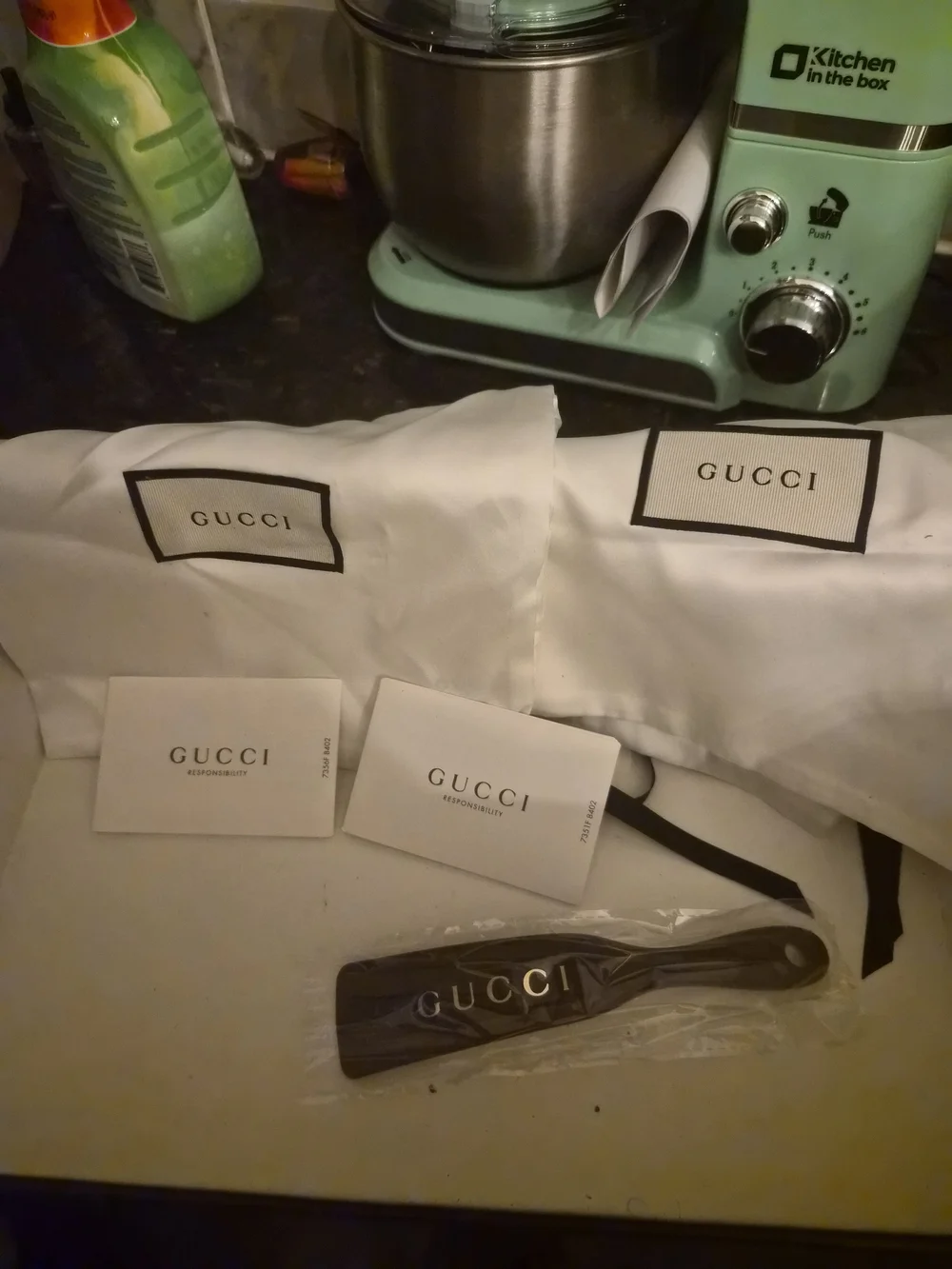 Gucci Black Embossed GG Leather Slip-On Sneakers with White Sole